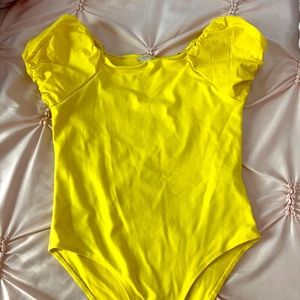 Kids yellow body suit